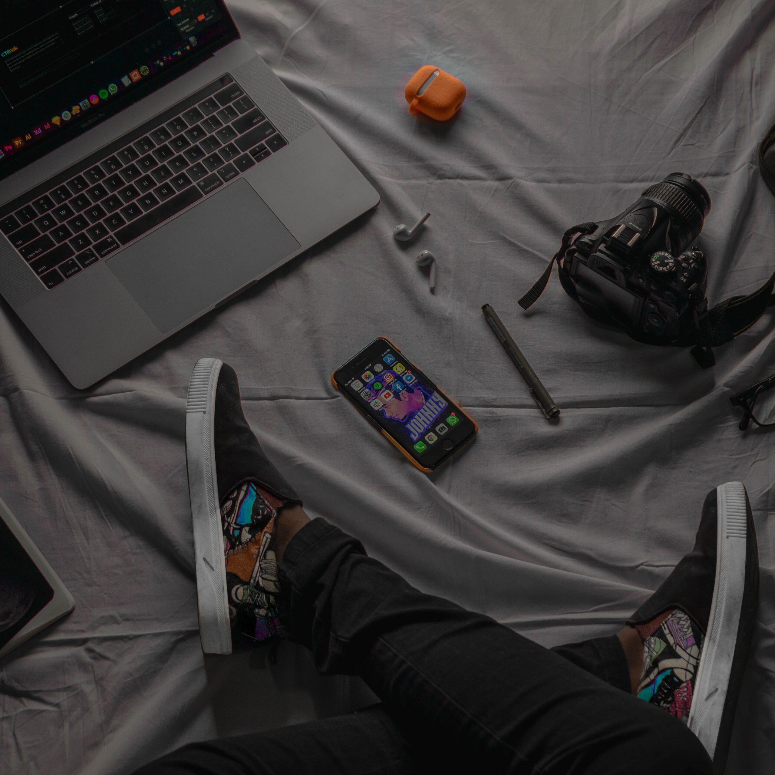 Modern tech gadgets flat lay with laptop and camera, premium corporate gifts from factory production line electronics