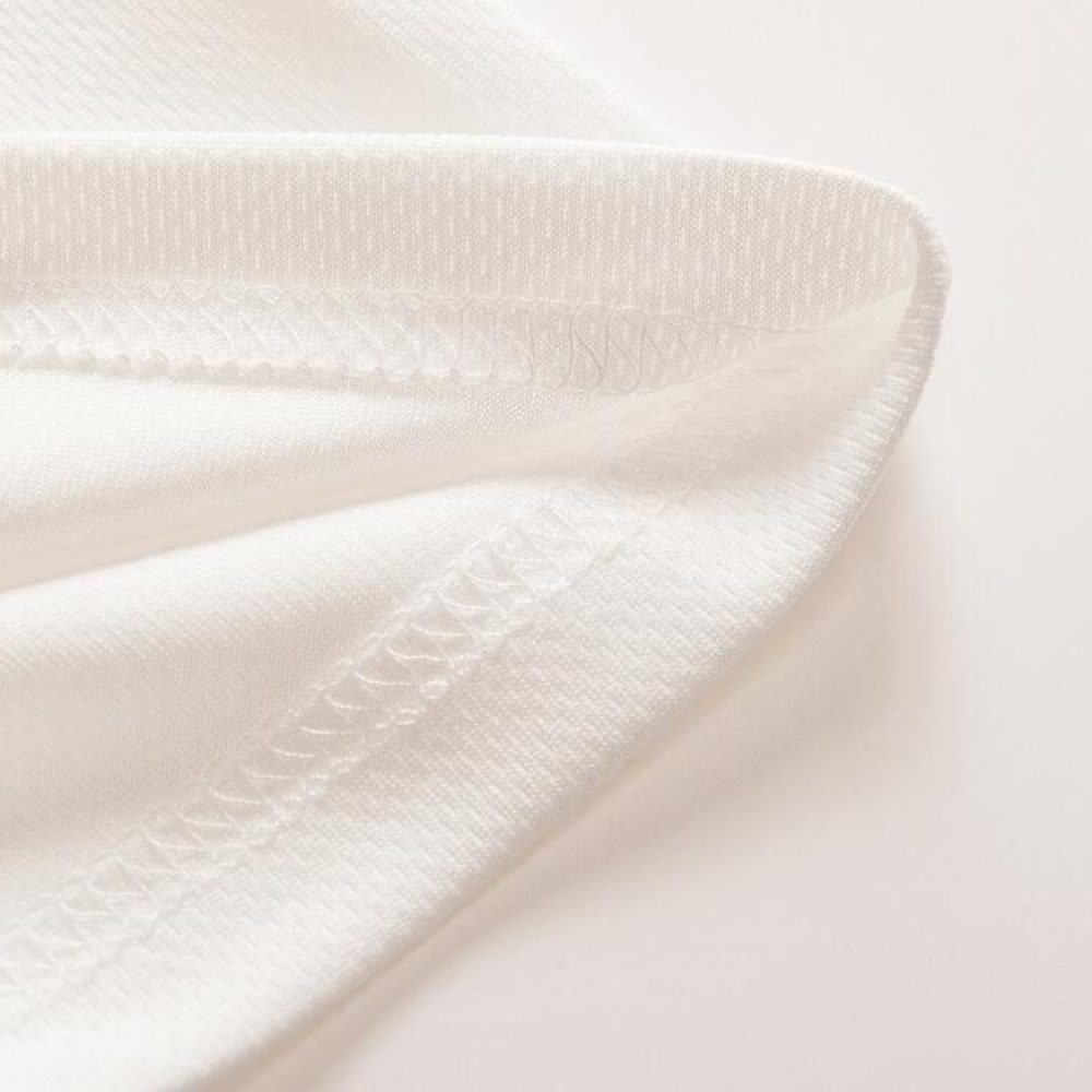 Custom jersey fabric texture close-up, white breathable moisture-wicking athletic material for sublimation printing sportswear